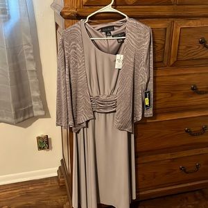 Beautiful gray/silver dress. Never worn.